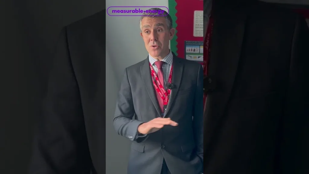 Iain Gunn, head teacher of St Peters, talking to camera in a school corridor
