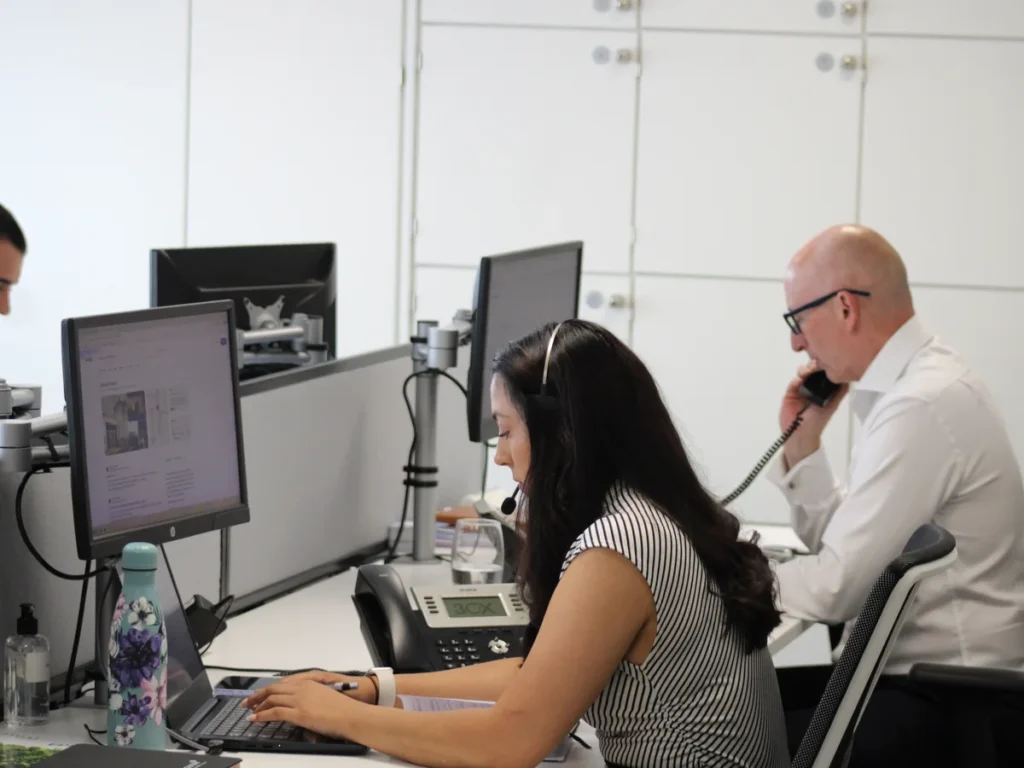 The Insight Systems helpdesk team taking support calls